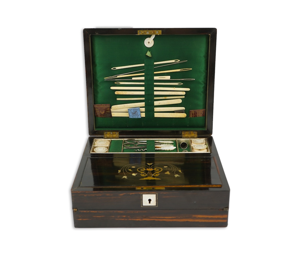 A mid 19th century rosewood writing and sewing box